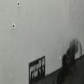 Installation View<br> Holes in the wall and wall paper